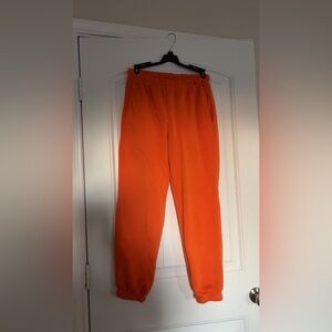 S orange garage sweatpants.